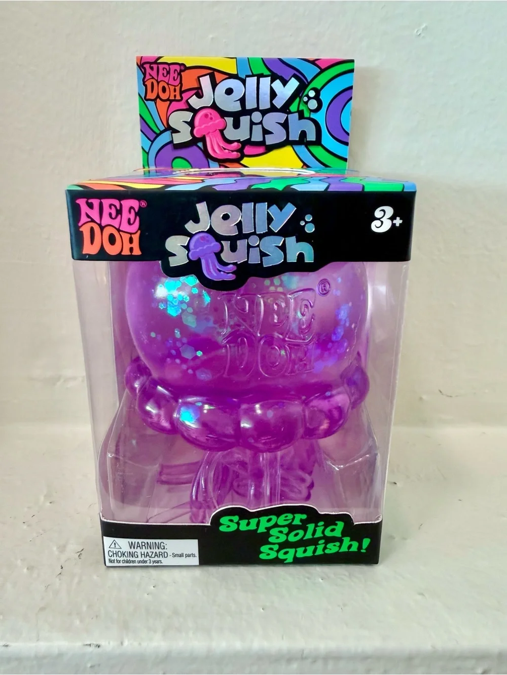 100% AUTHENTIC Schylling Needoh Jelly Squish - purple. Brand new, unopened!